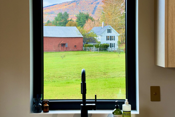 Custom soapstone countertops are complimented by views and all the accessories you could need.