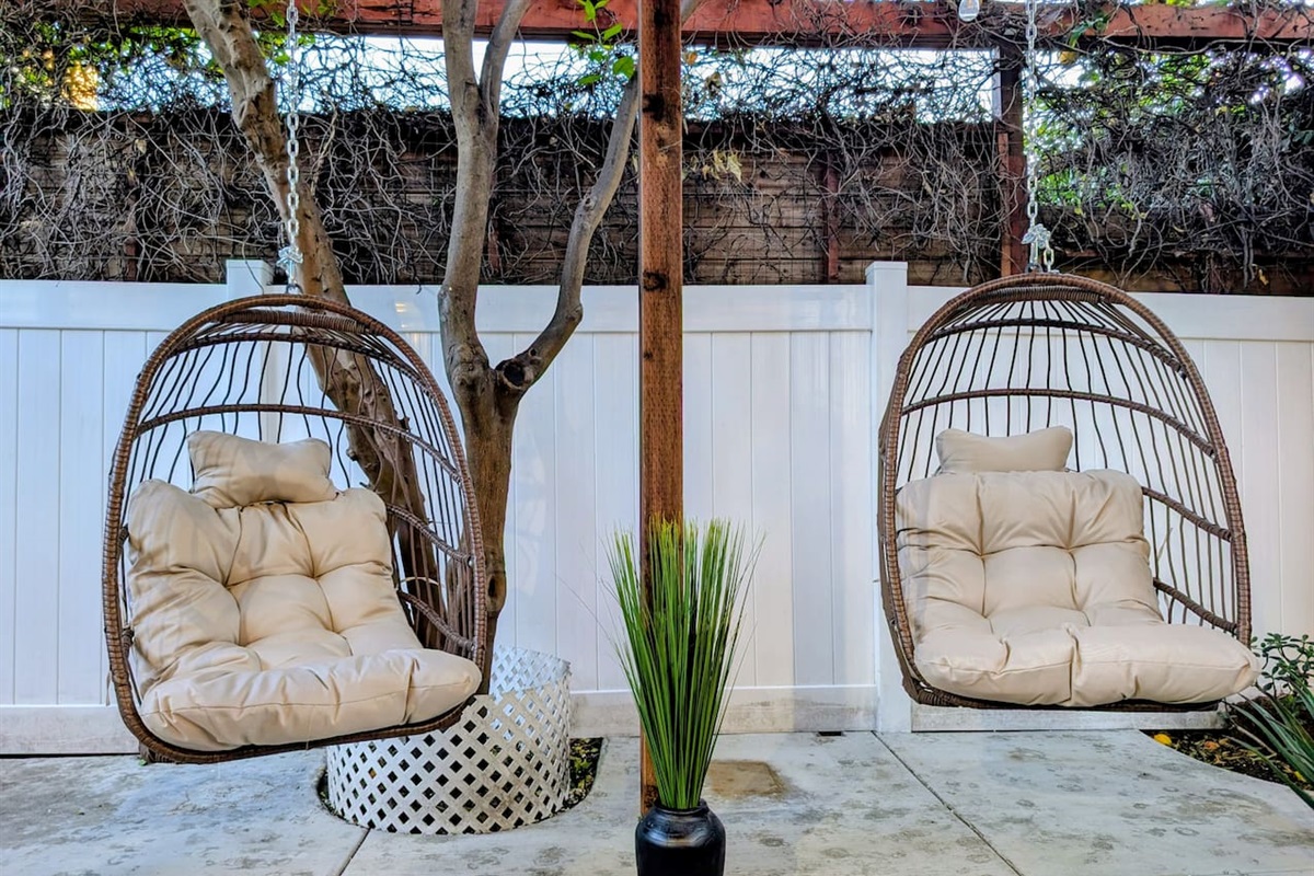 Cozy hanging chairs and a peaceful atmosphere.