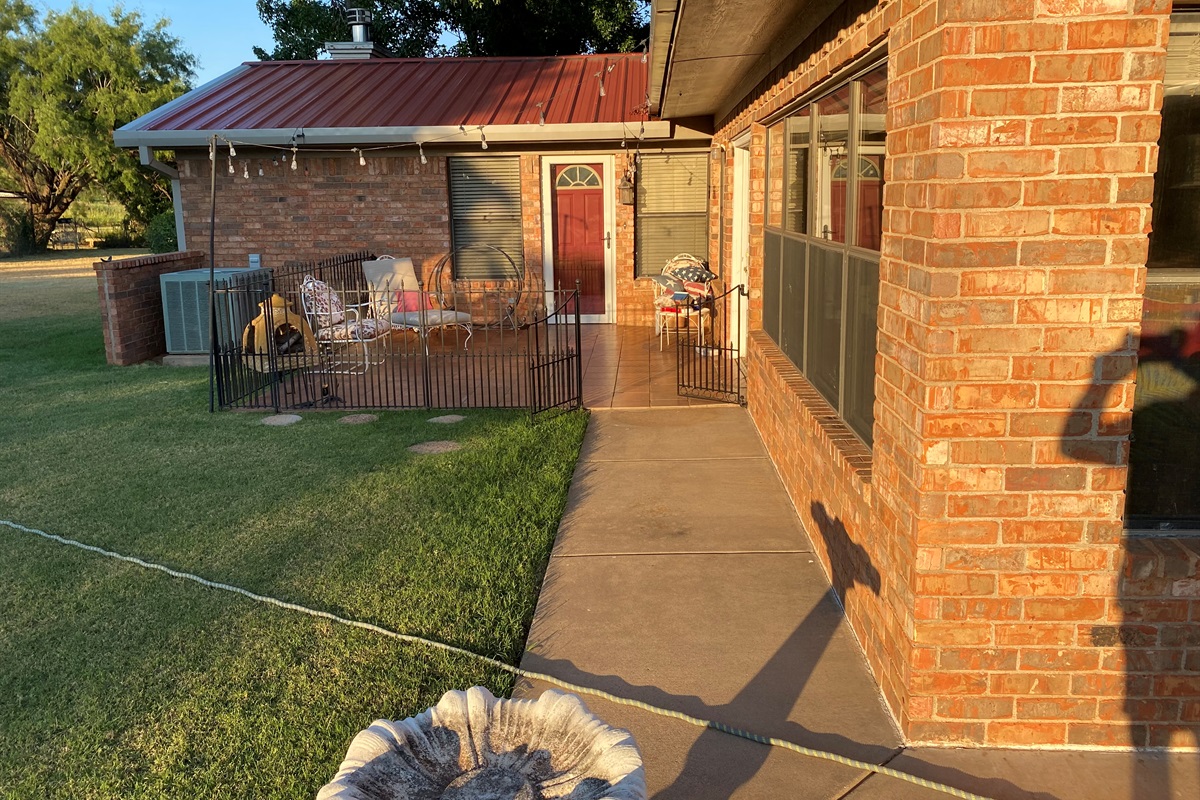 The red door in the courtyard is the apartment