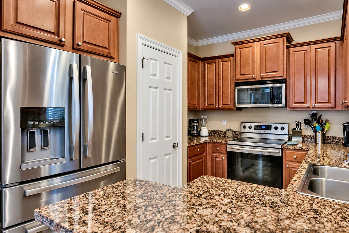 Kitchen has a full-sized refrigerator, coffee maker, stove, oven and more! All here to make meal prep a breeze!