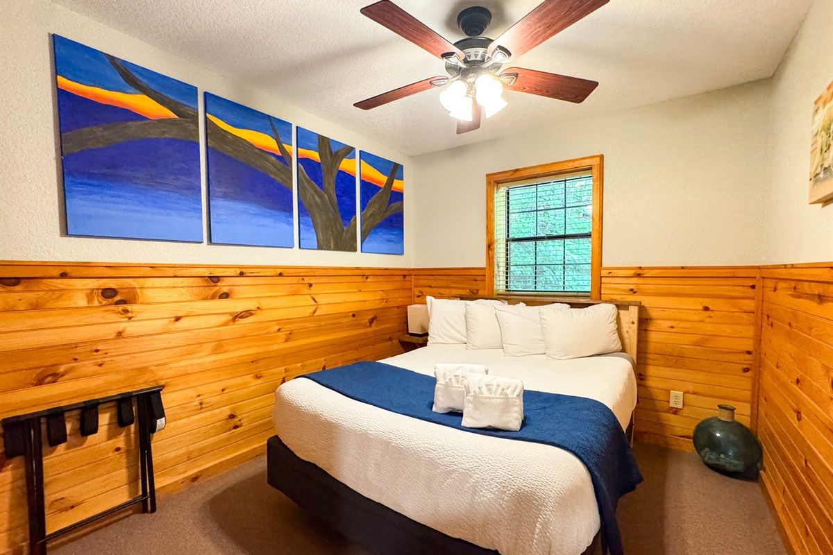 the Lower level bedroom is off the game room. It features a hybrid memory foam bed with shredded bamboo pillows. 