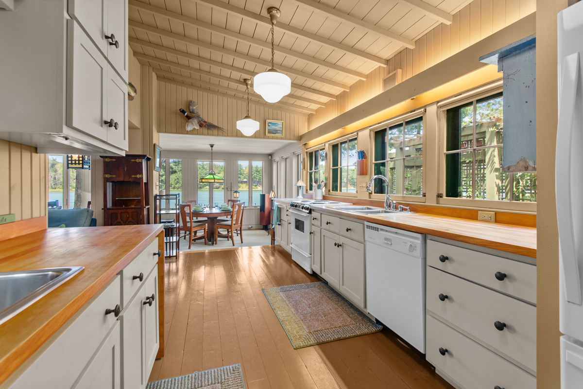 Gather in the open kitchen to cook, laugh, and make memories together, with plenty of dishes, appliances, and everyday essentials to make mealtime easy.
