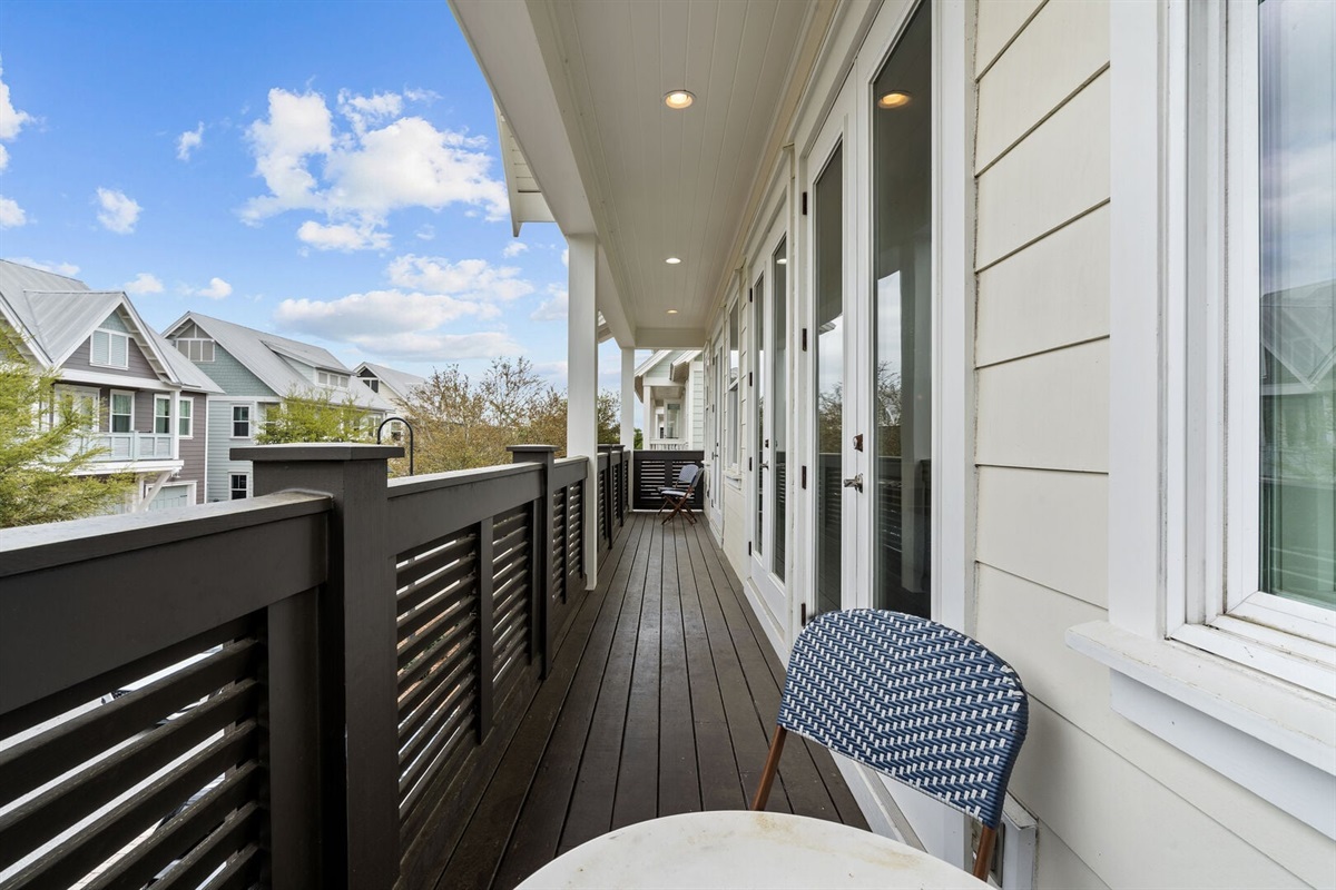Private balcony with outdoor seating.