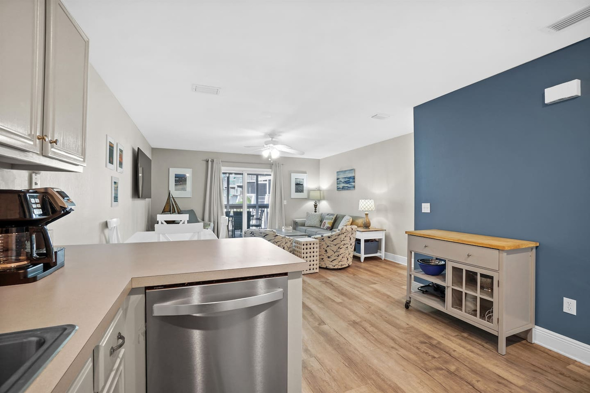 Cook together in the open plan where the kitchen flows right into the dining table and living area.