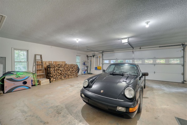 In the oversized two car garage you will find firewood for the indoor fireplace, some outdoor games, and gravity grabbers for ski and snowboard storage.