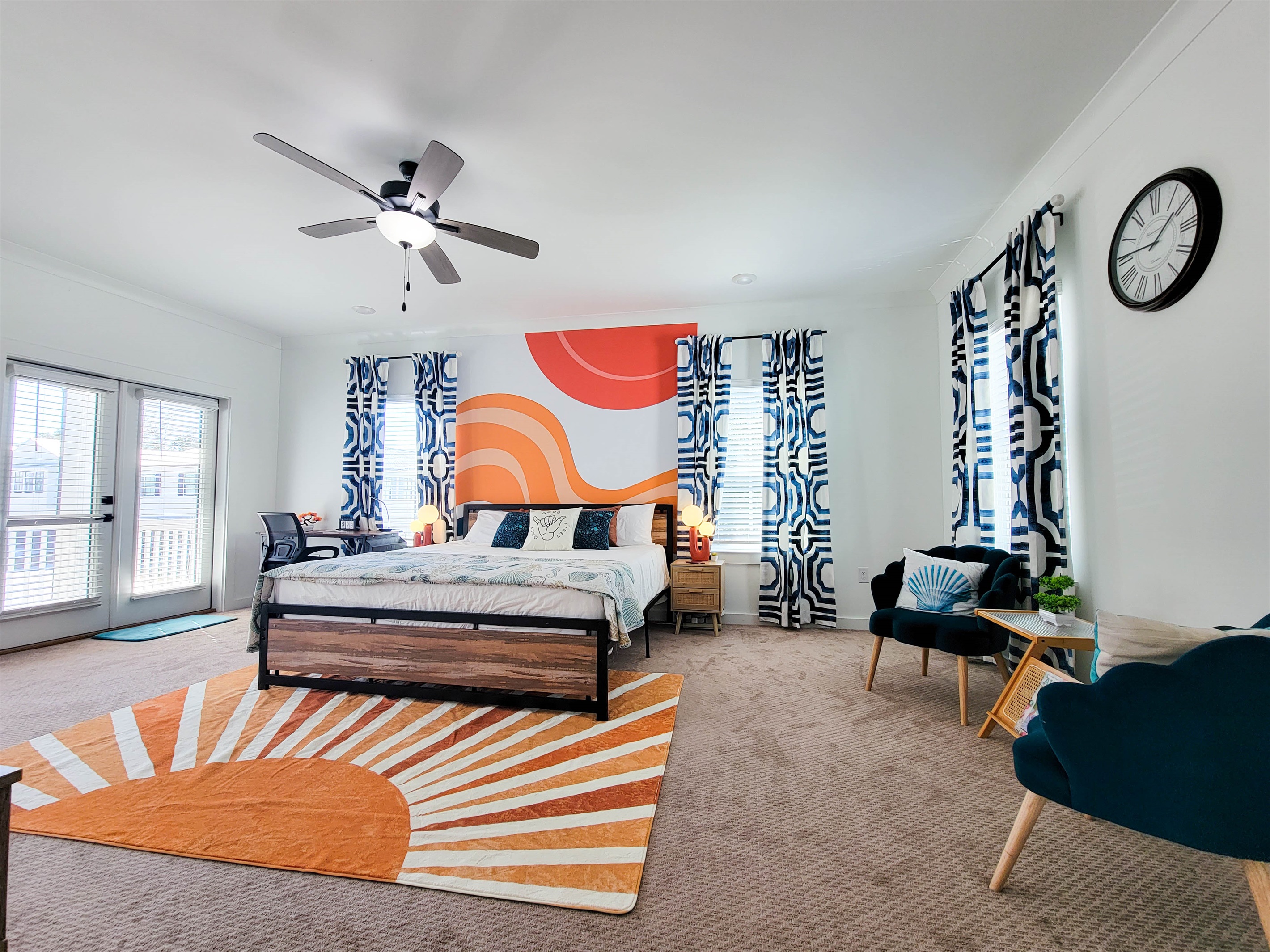 Huge Master's Bedroom with a King Bed, Smart TV, Workspace, and a Small Area for Coffee