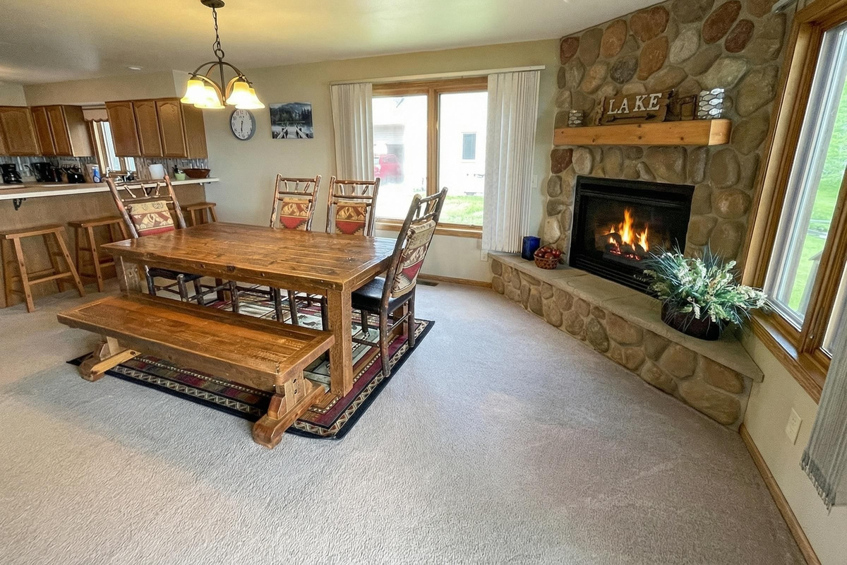 Dining Room - Upper Level Table with Fireplace (Alternate View)