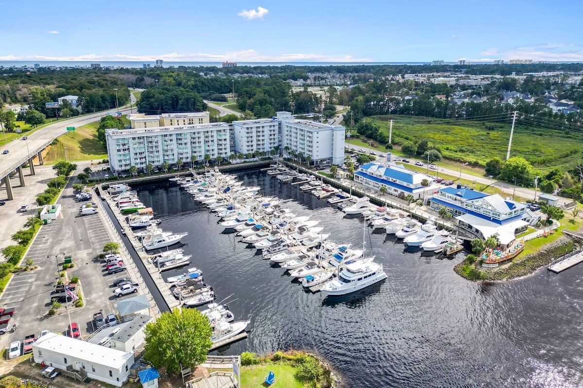 Located at Harbourgate Marina—steps from boating, fishing, jet skis & waterfront dining