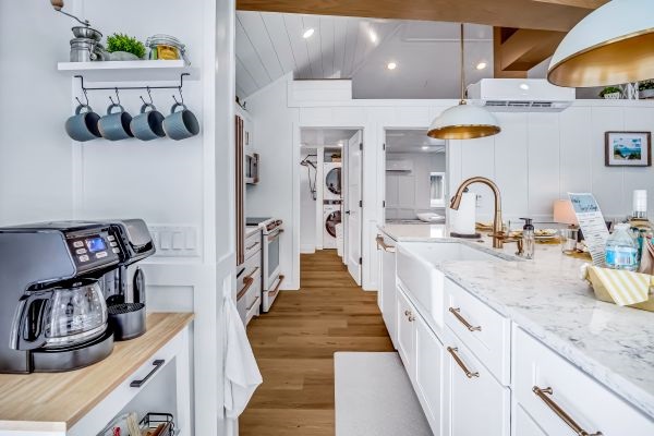 Fully equipped kitchen, warm and inviting for winter cooking and cozy meals.