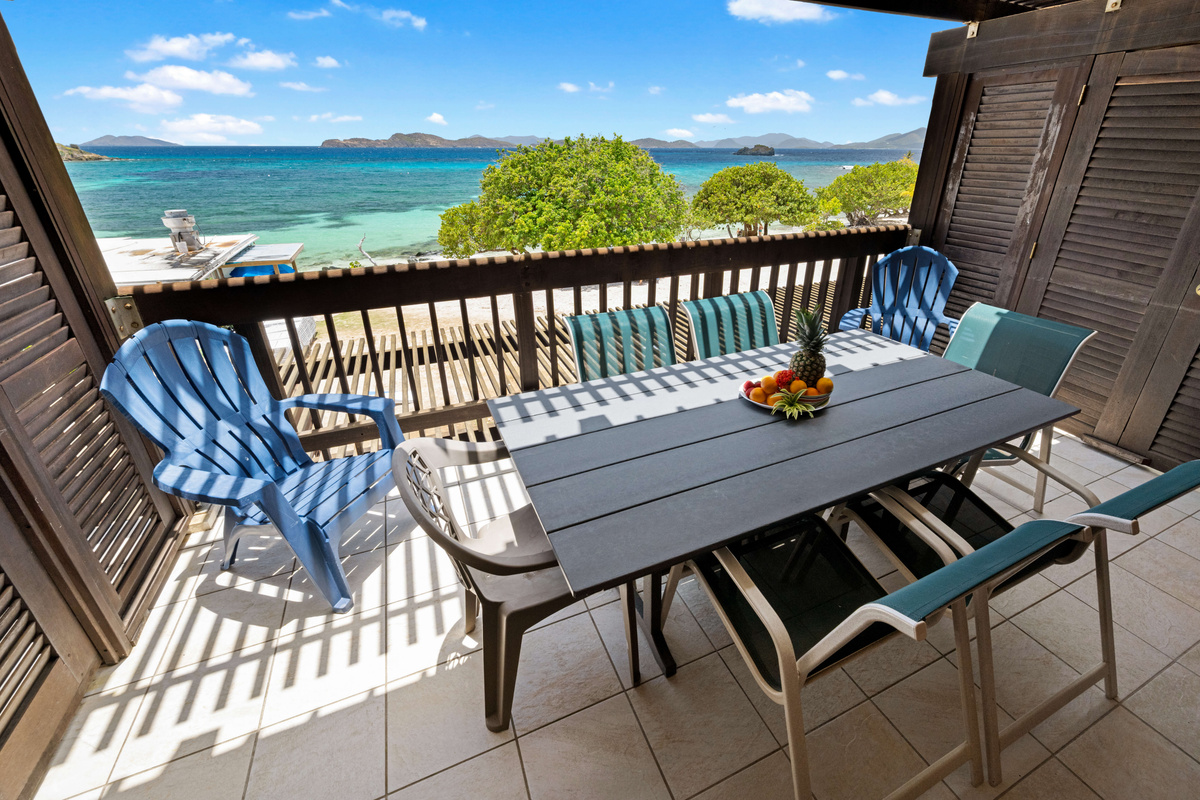 Watch boats drift by as you relax above the shoreline.