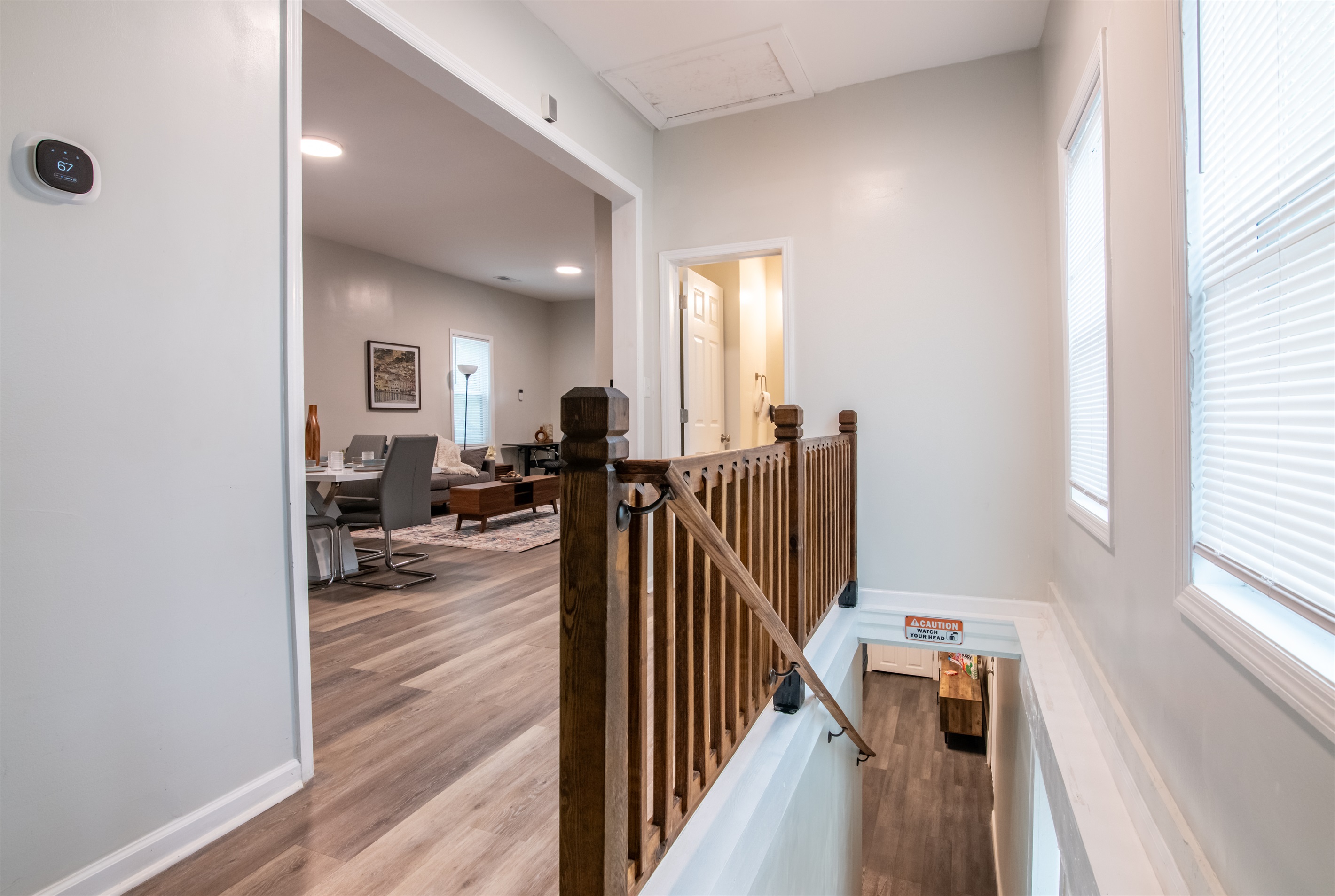 A welcoming hallway accented with warm, modern décor.