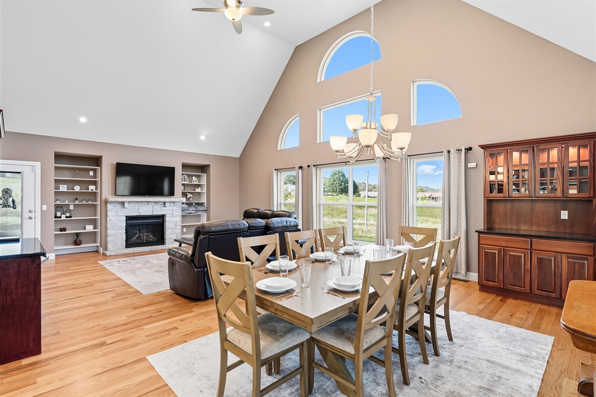 Light-filled open dining/living room with countryside views.