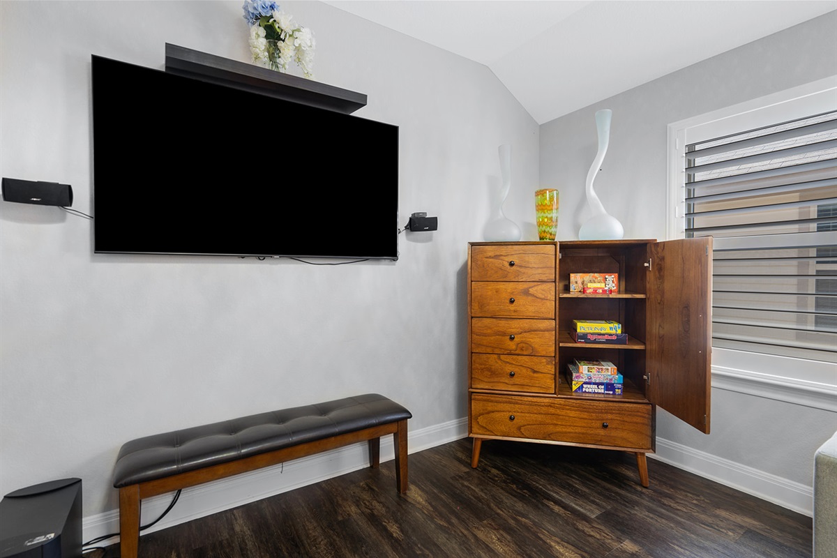 “Unwind your way — stream a show or dive into a board game classic.”   (Monopoly + Candy Land ready to play)