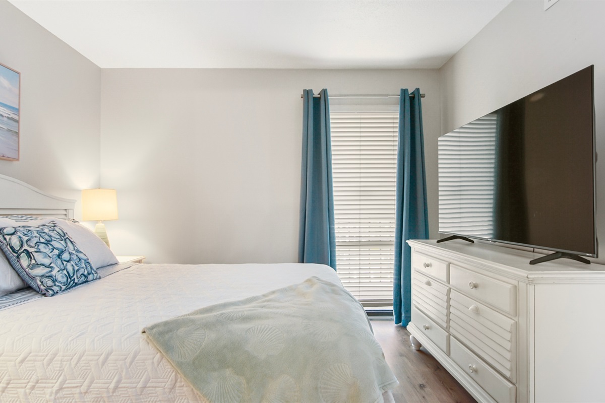 Second bedroom with queen bed, and bathroom access