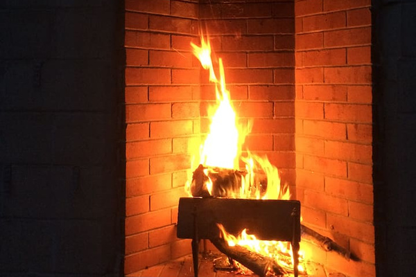 The outdoor terrace fireplace adds a warm glow while dining, star gazing or enjoying an after dinner drink. 