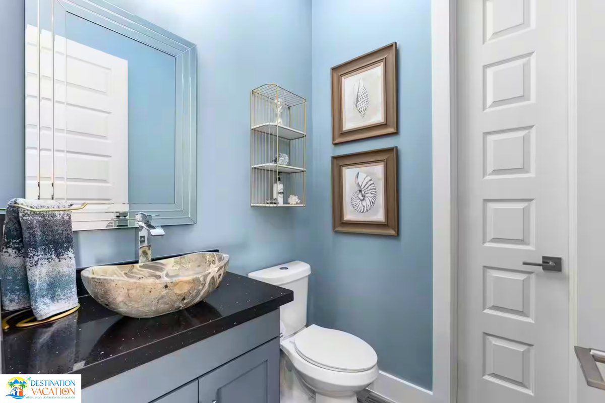 A charming bathroom retreat with thoughtful coastal touches.