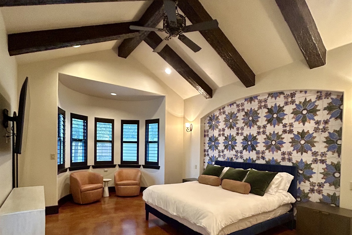 Serenity in every detail – a stunning Spanish-style master bedroom that blends timeless elegance with tranquil comfort. Bedroom 1