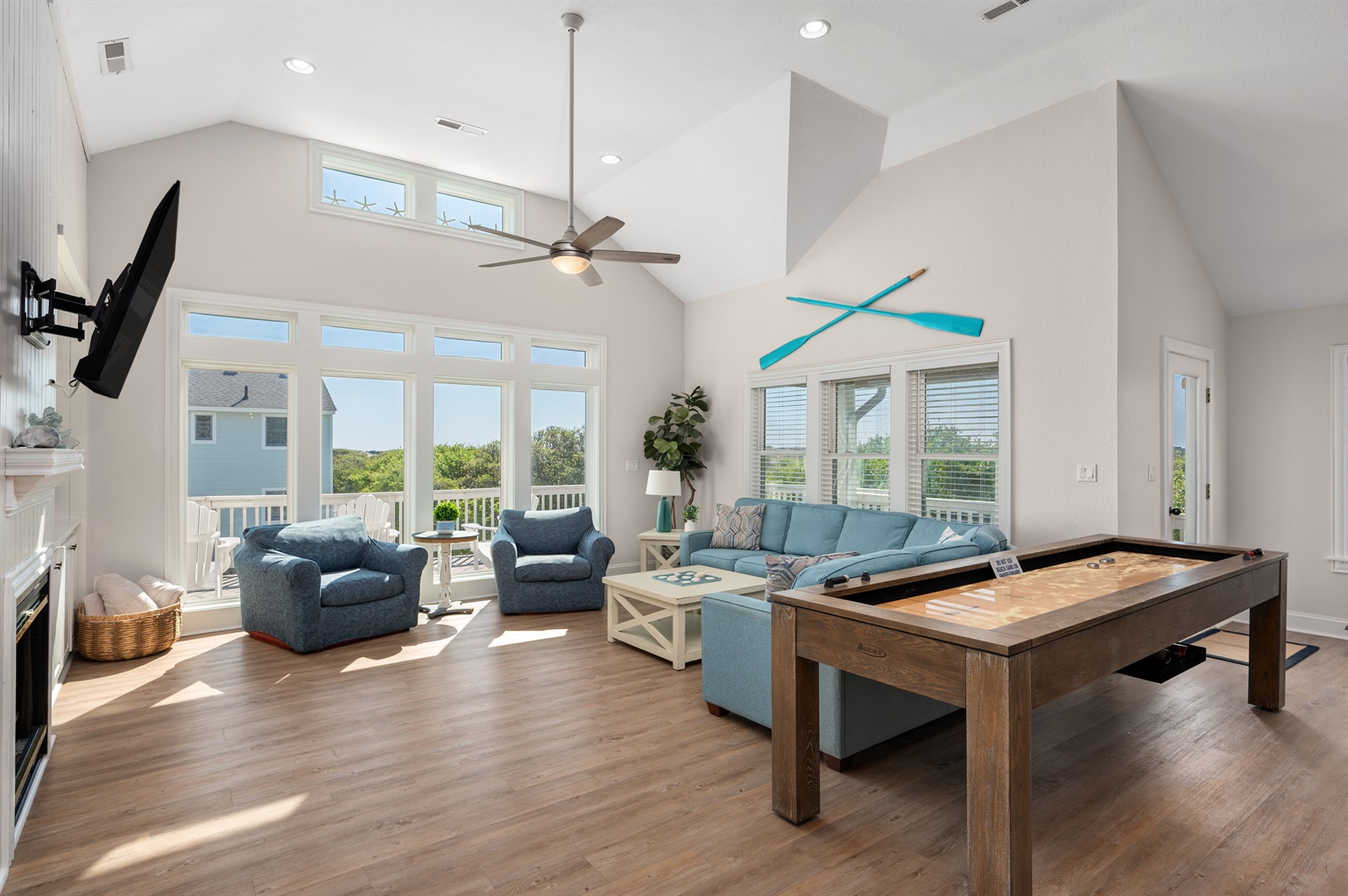 Enjoy ample lounging space plus a fun game table for evenings in together.