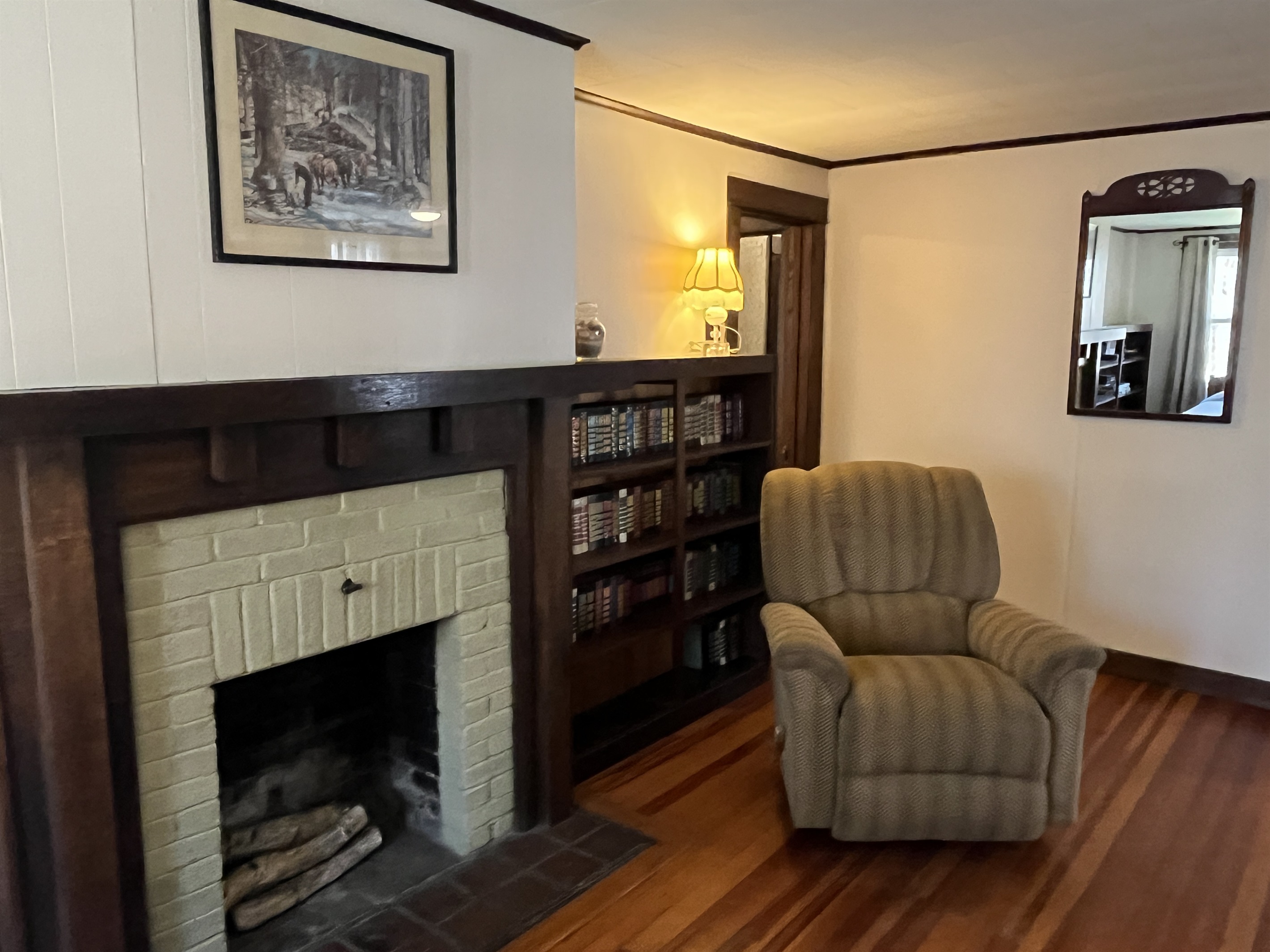 Twin bedroom with decorative fireplace
