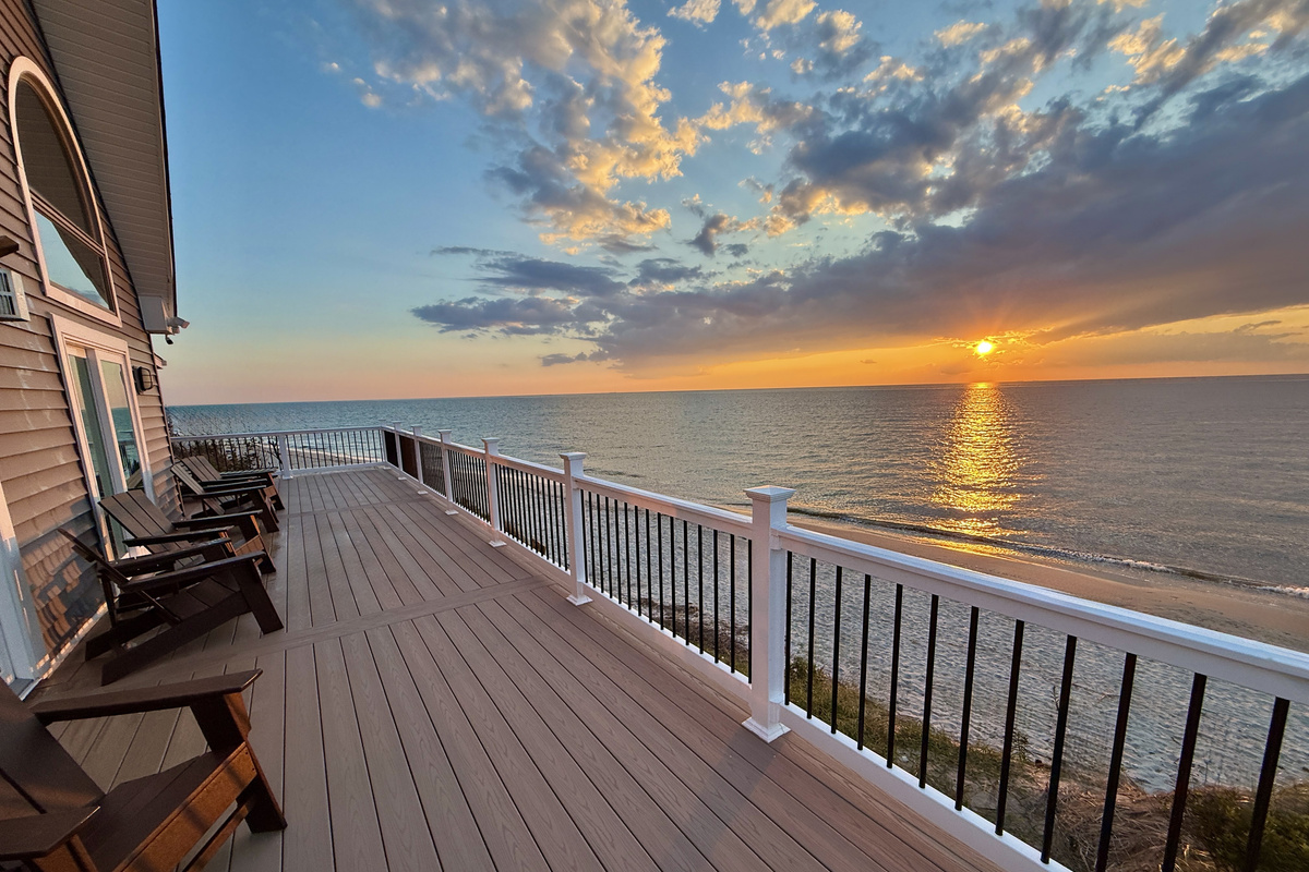Unwind on the expansive private deck, which provides an ideal setting to enjoy a beautiful sunset over the ocean. The deck is equipped with comfortable lounge chairs, making it a perfect spot for relaxation.