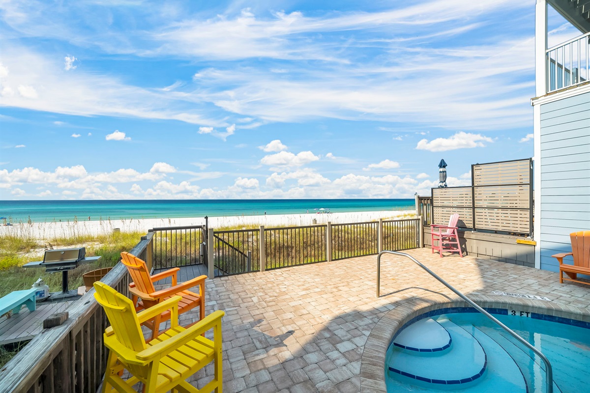 Swim, sun, or stroll: enjoy the shared beachfront pool, sundeck, outdoor shower, and private boardwalk to the sand — plus a shared grill for those perfect cookout nights.
