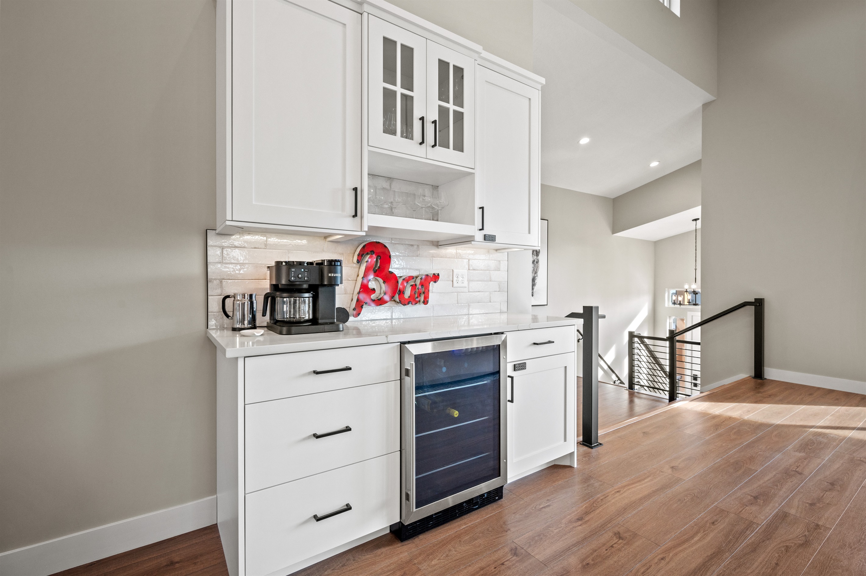 Wine fridge and versatile coffee station make this bar perfect morning or night.