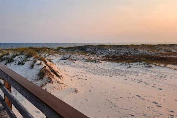 walking to the beach at sunset