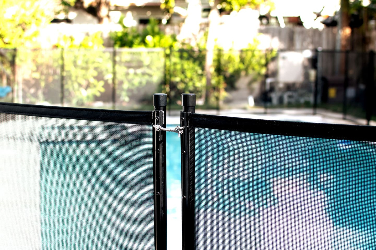 High quality child safety fence surrounds the pool.