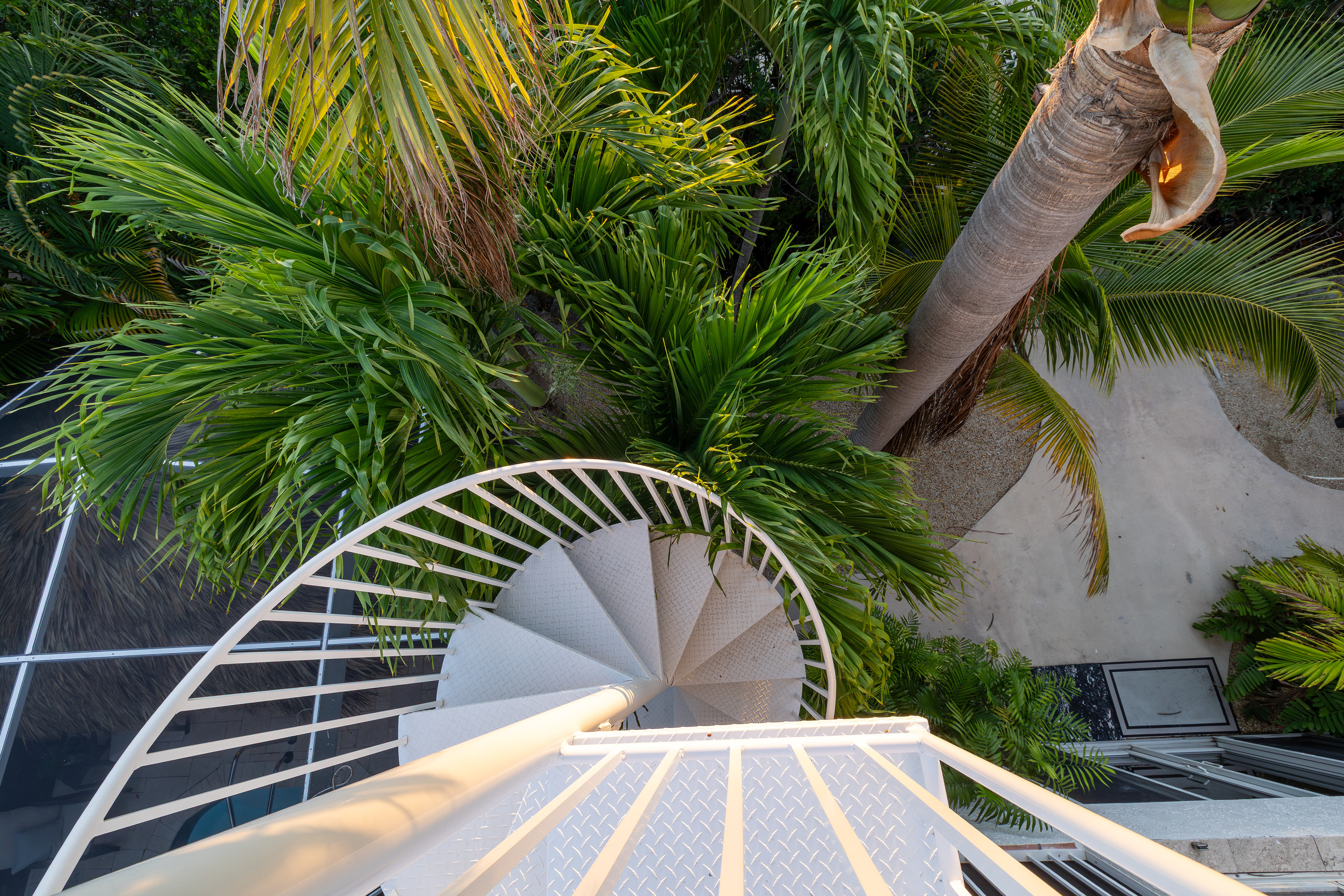 Head up the spiral stairs to the observation sun deck.