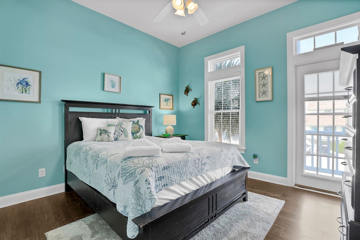 This bedroom is located on the middle level and has an ensuite bathroom.