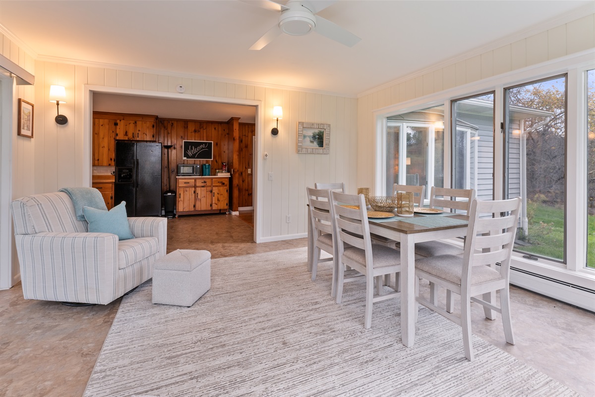 Cozy four season sun room that extends into the kitchen