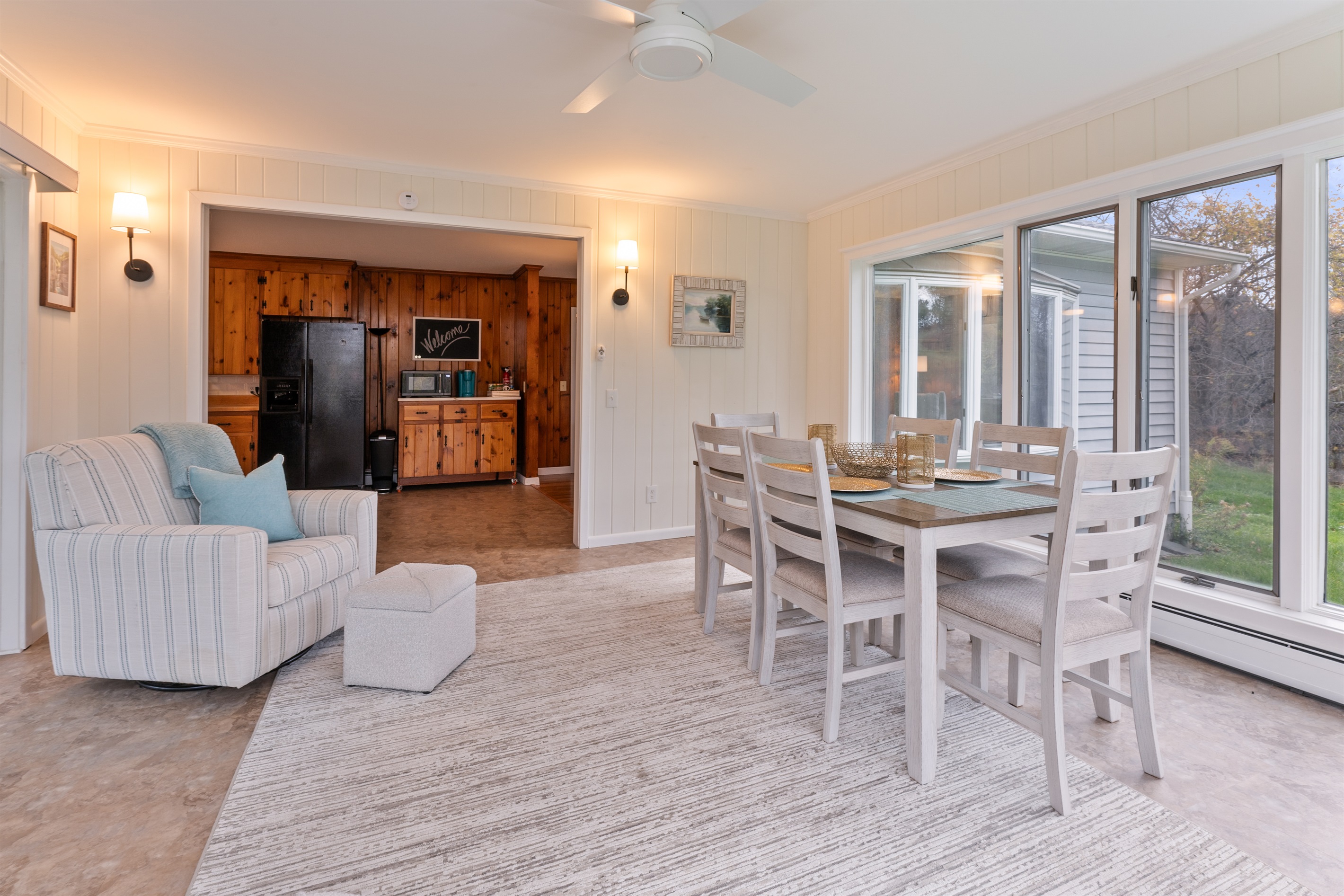Cozy four season sun room that extends into the kitchen