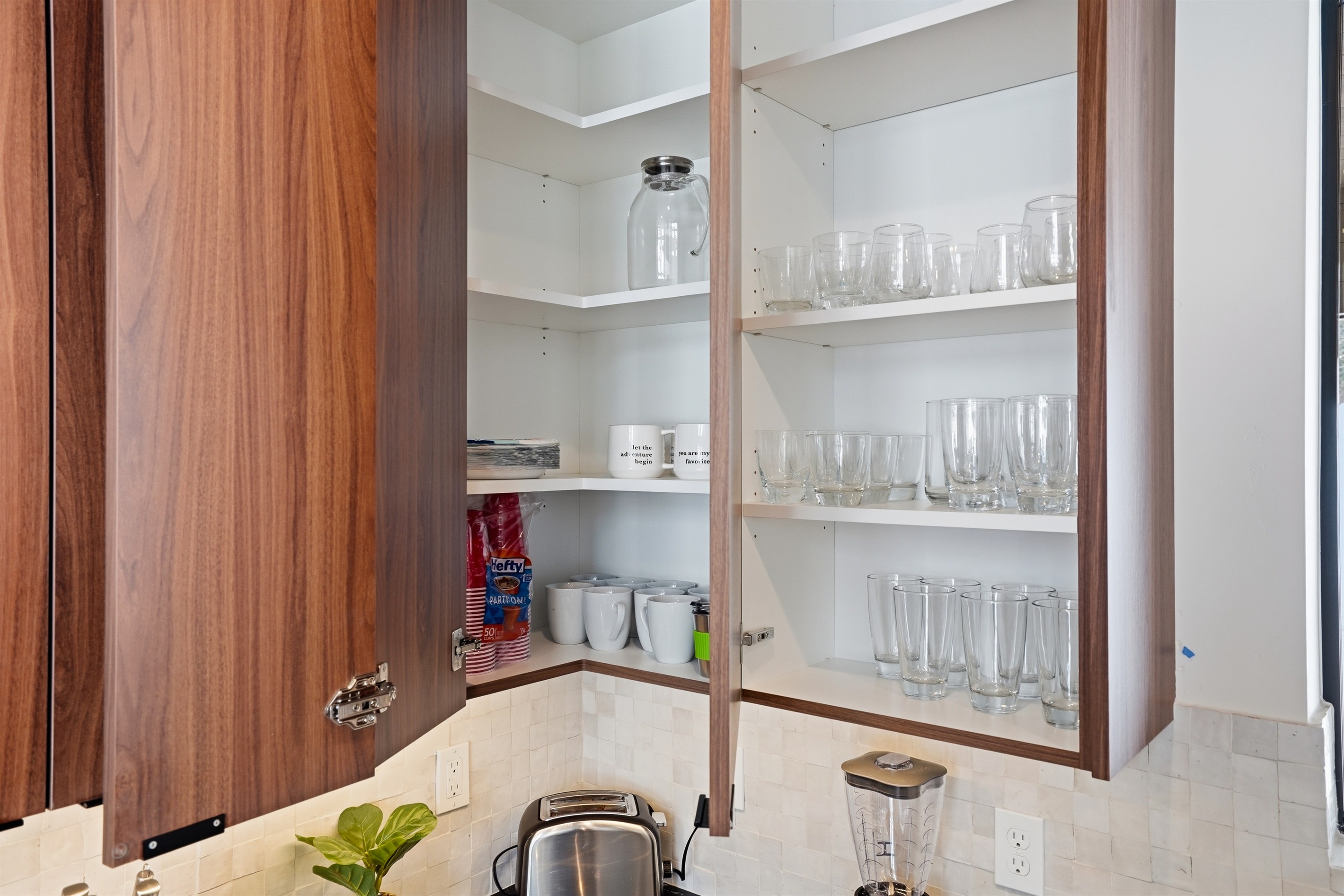 Fully Stocked Cabinets with Glassware and Mugs