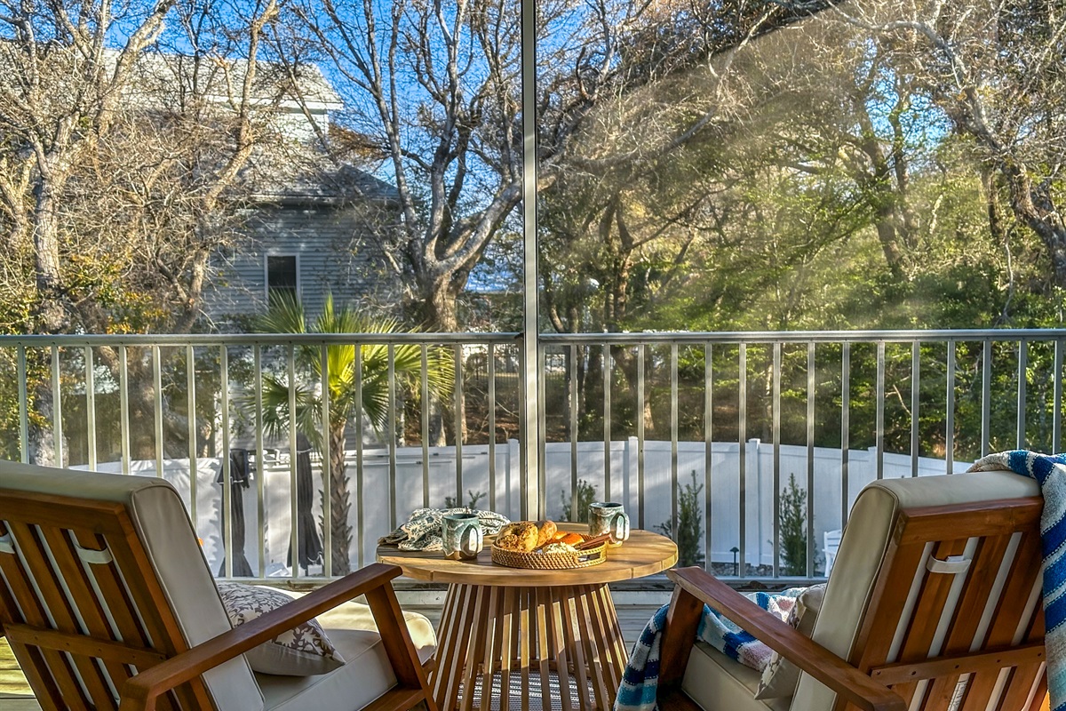 The balcony overlooks the pool area.
