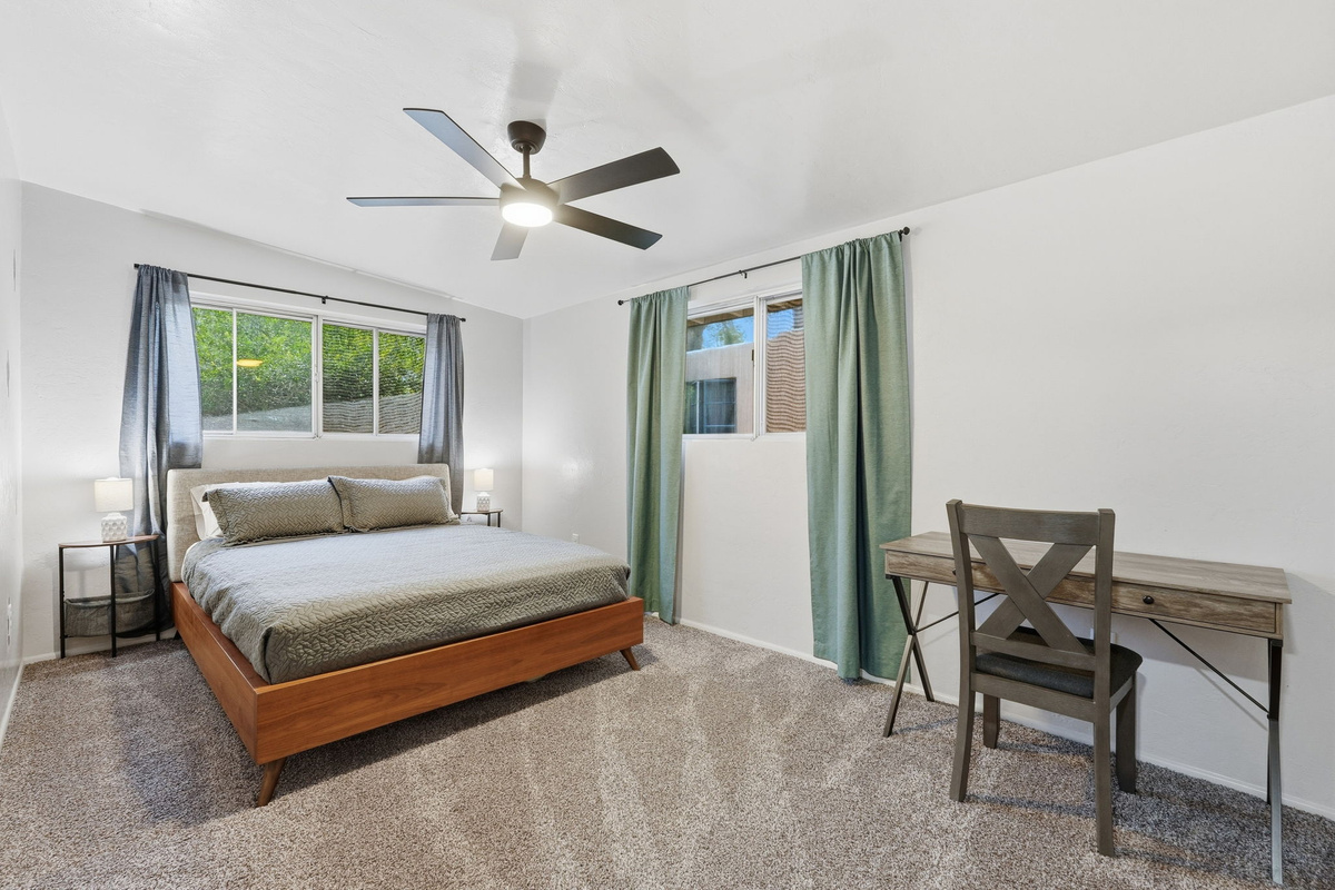 Flexible Stay & Work Space: Features a dedicated workspace with high-speed Wi-Fi and a comfy queen bed.