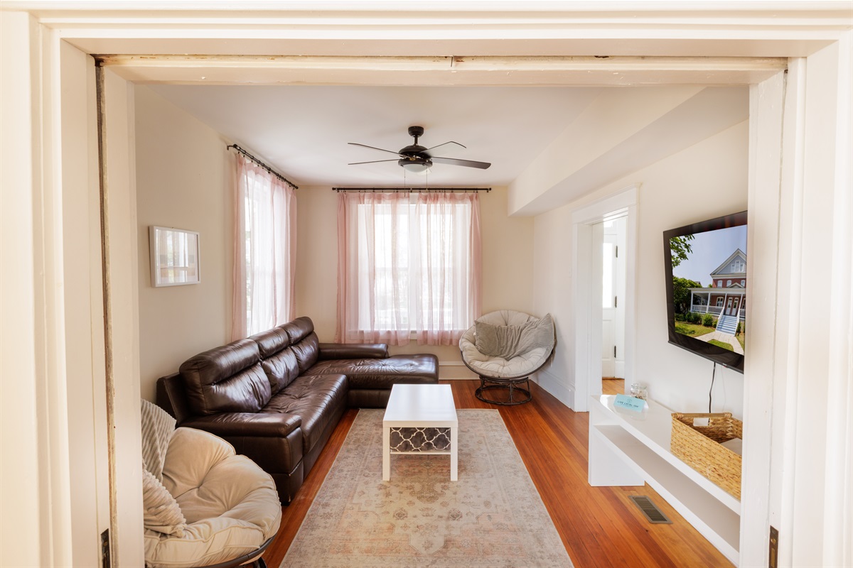 Plenty of lounge seating in the living.
