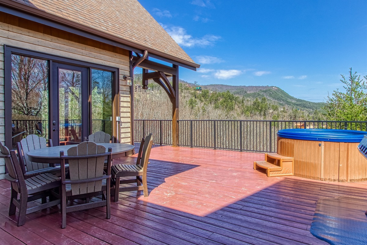 Spacious deck with stunning Smoky Mountain views and plenty of seating to soak it all in