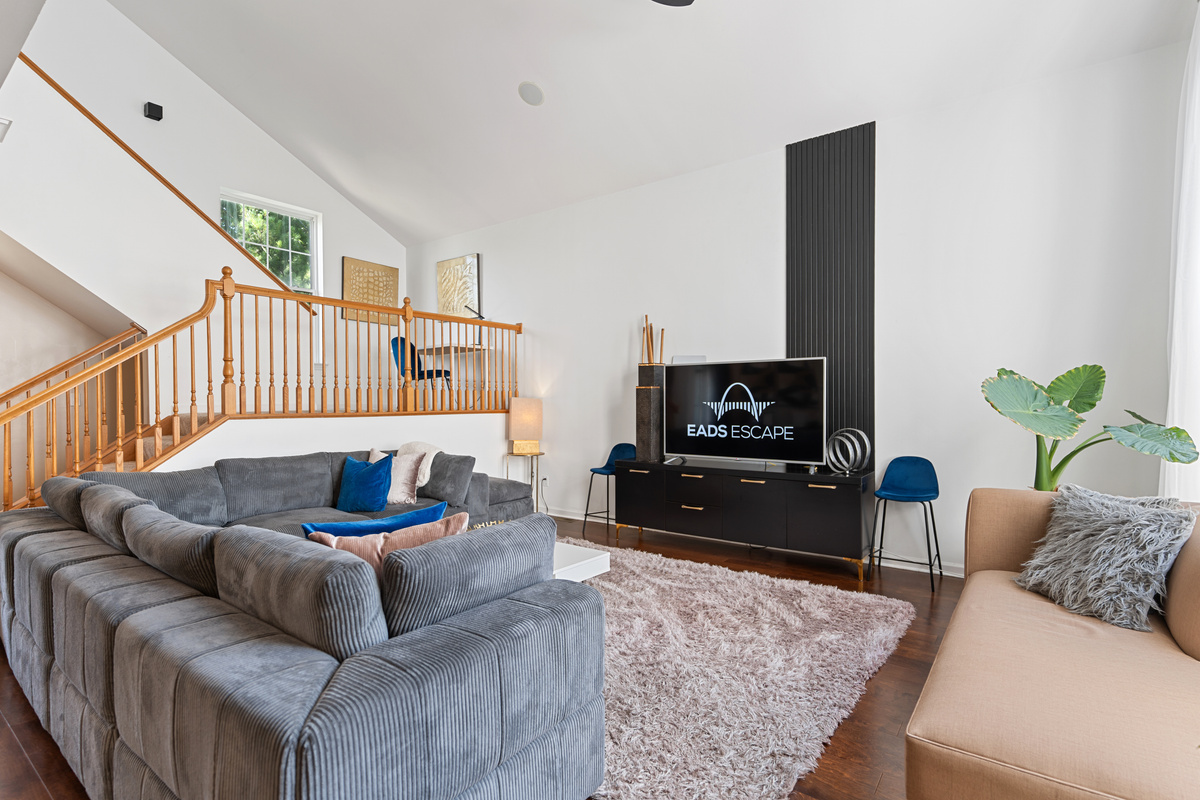 Vaulted ceilings, natural light, and modern style create an airy, welcoming vibe.