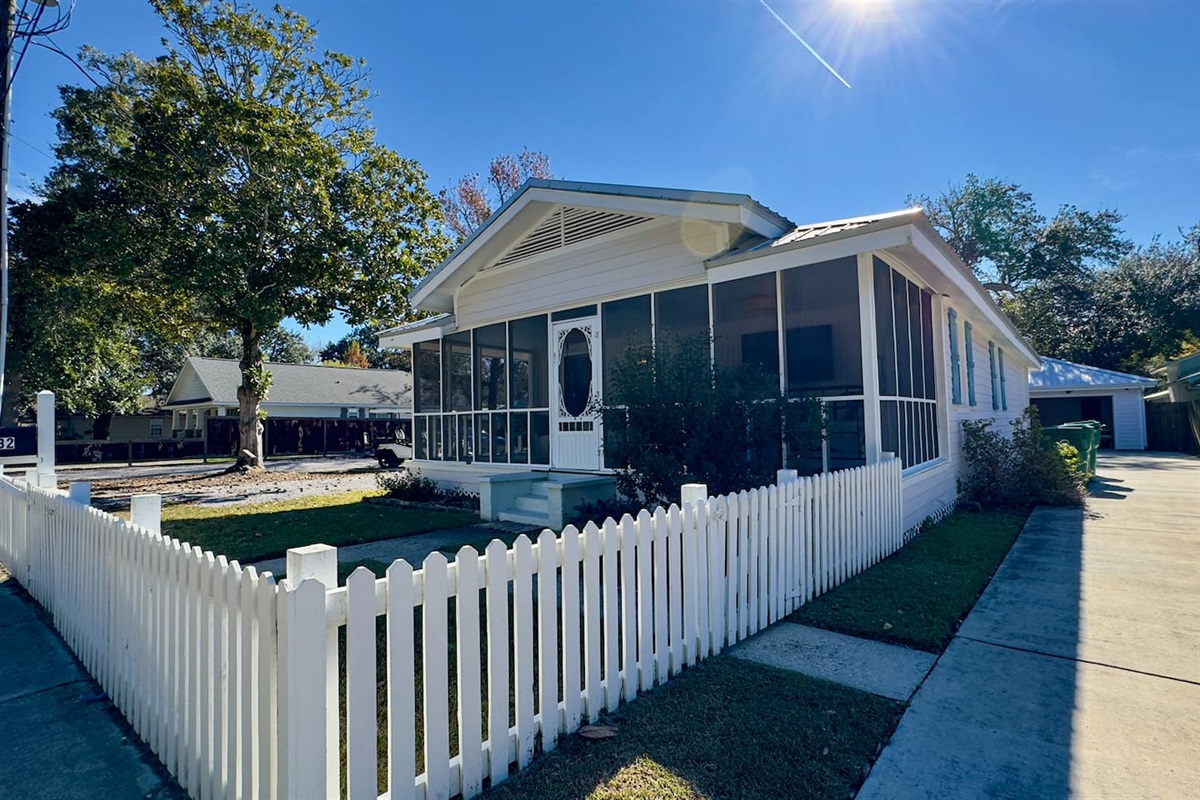Classic charm with a screened porch and peaceful vibes.