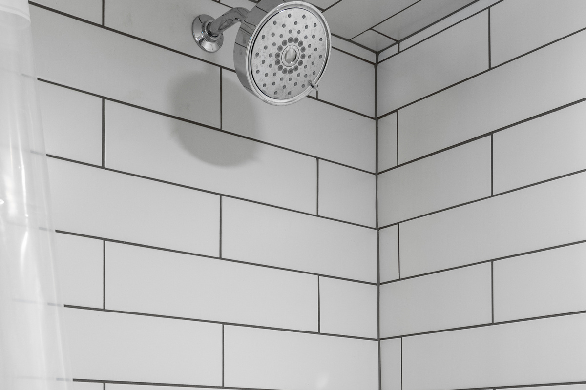Enjoy a refreshing shower with the convenience of both an overhead showerhead and handheld wand, making it easy for everyone to rinse off and unwind.