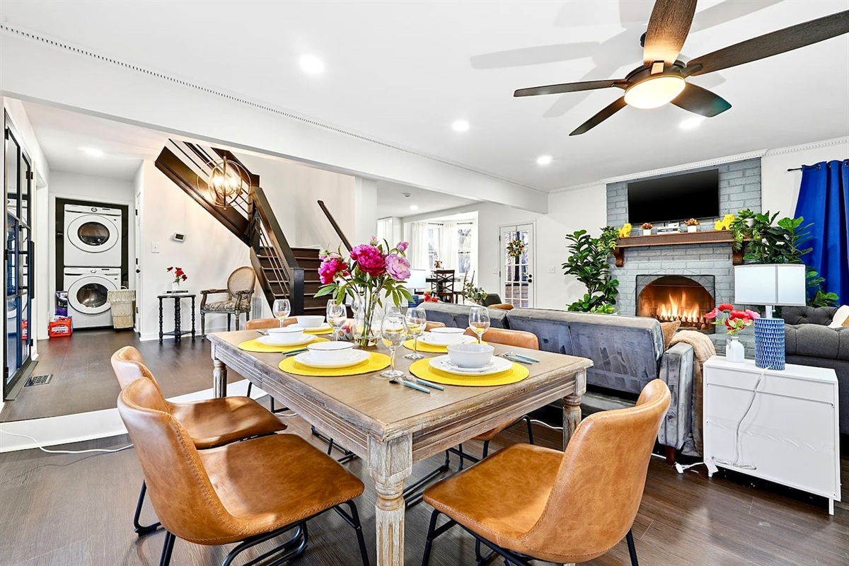 Charming wooden dining area comfortably seating up to 6 guests. Perfect for sharing meals, laughs, and creating lasting memories.