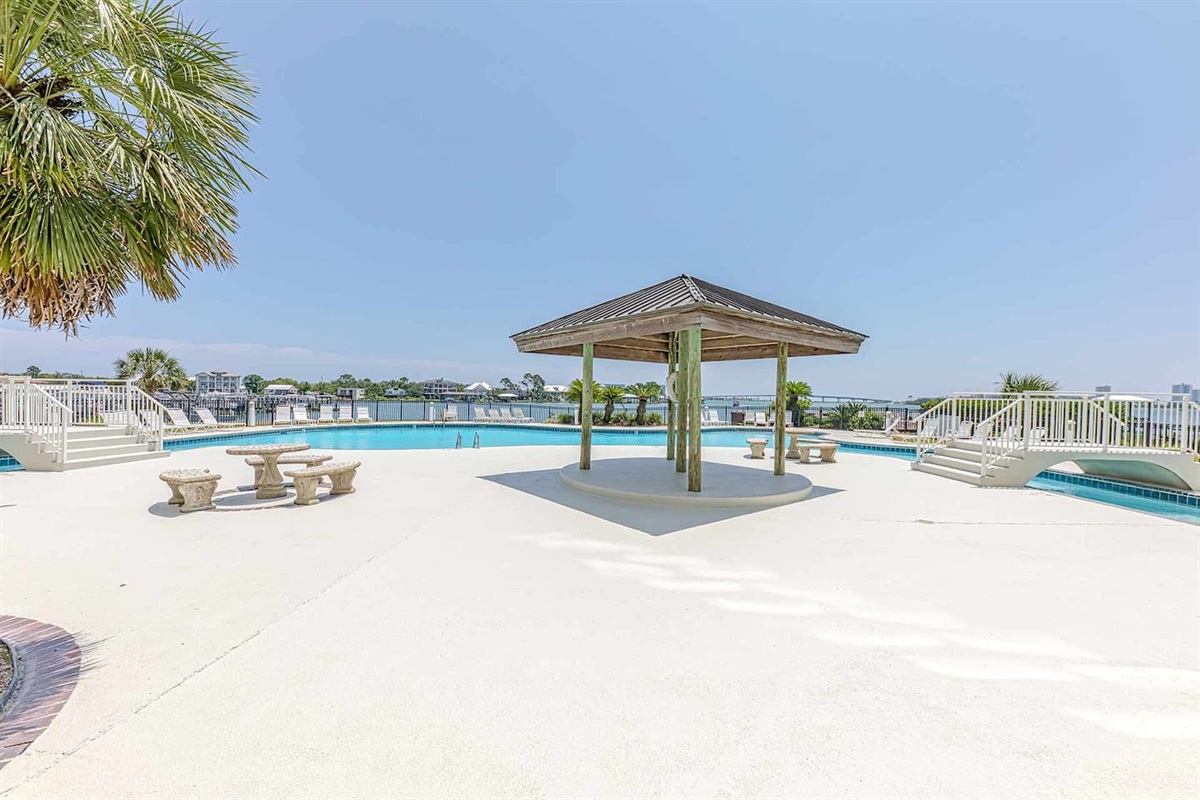 Outdoor Oasis: Enjoy sun-soaked afternoons by the pool with stunning views in Orange Beach!