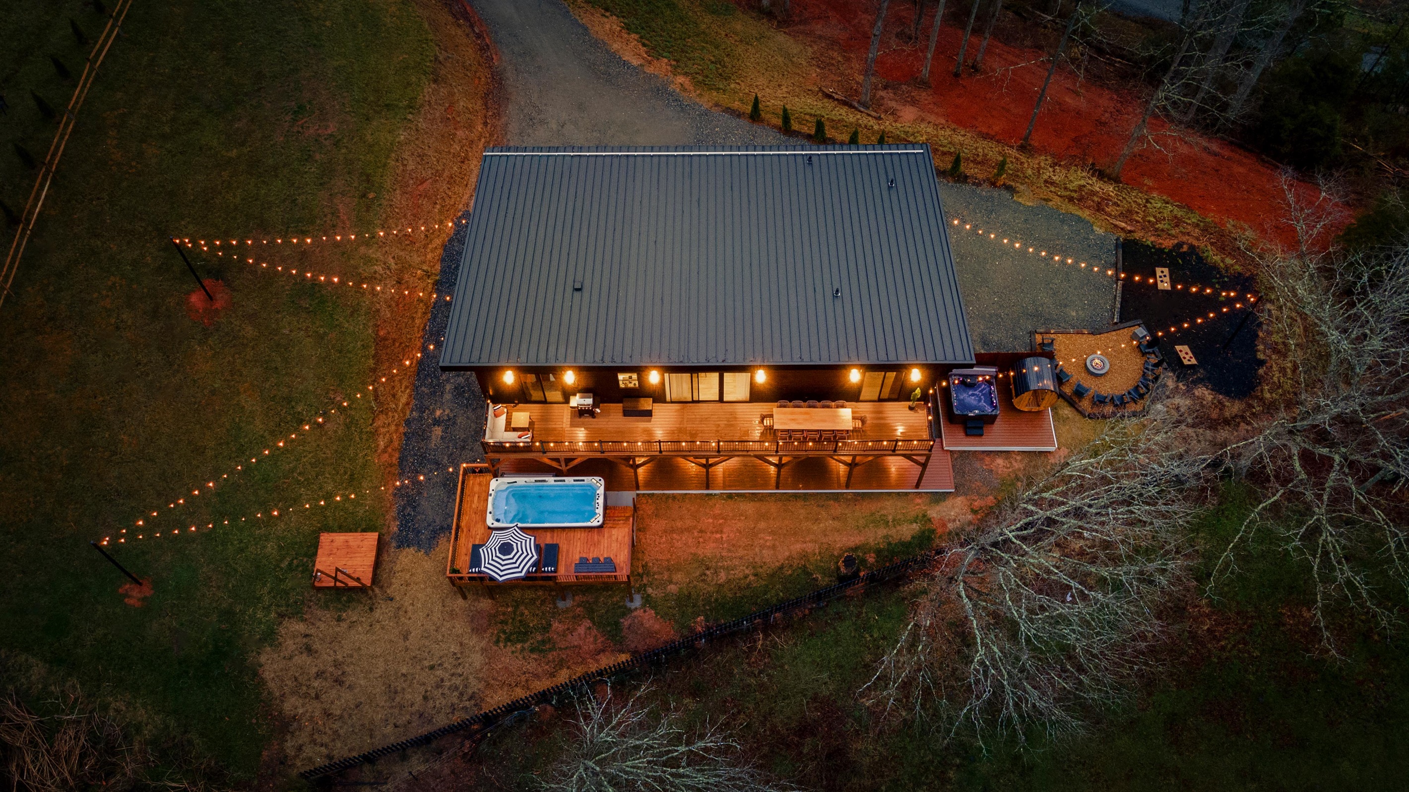 {Estate Aerial} From the Swim Spa to the Speakeasy, there is always something to enjoy at Summit House. 