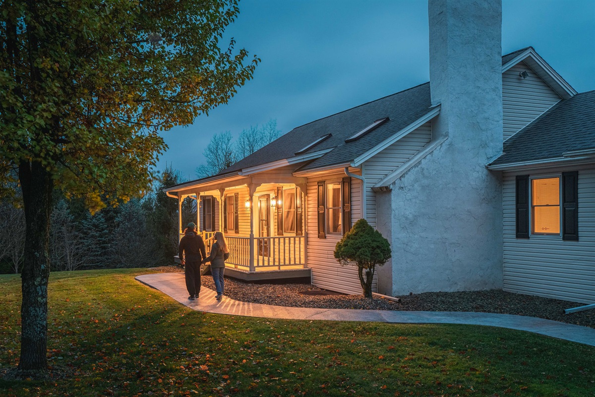 Warm, welcoming front porch perfect for evening relaxation