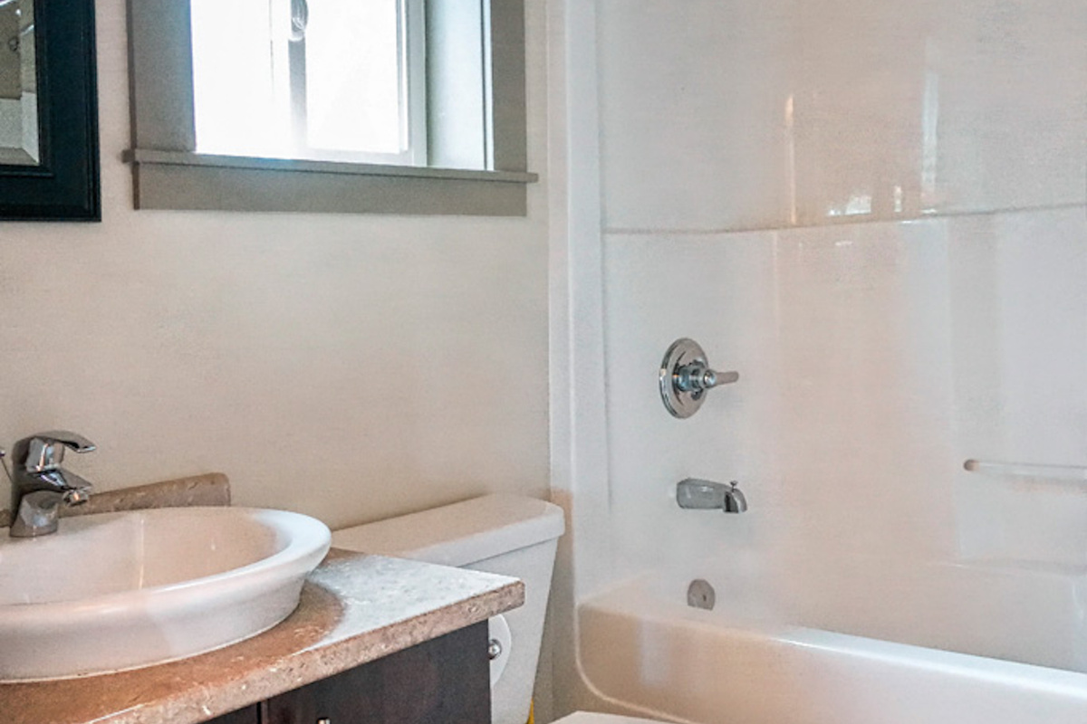 Bathroom with shower and tub