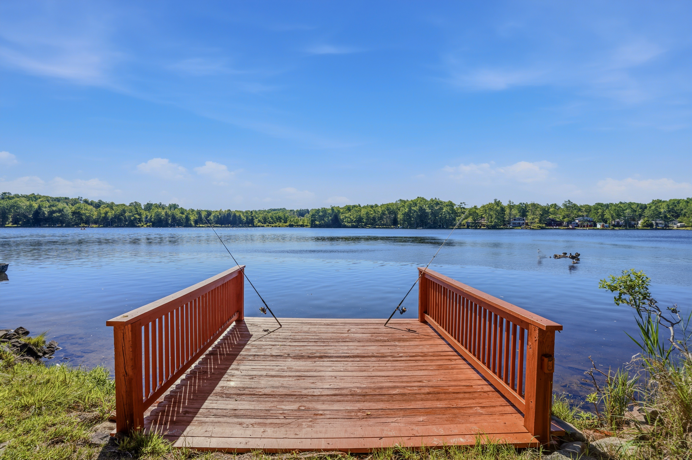 Private dock extending over Lake Carobeth — your direct access to the water