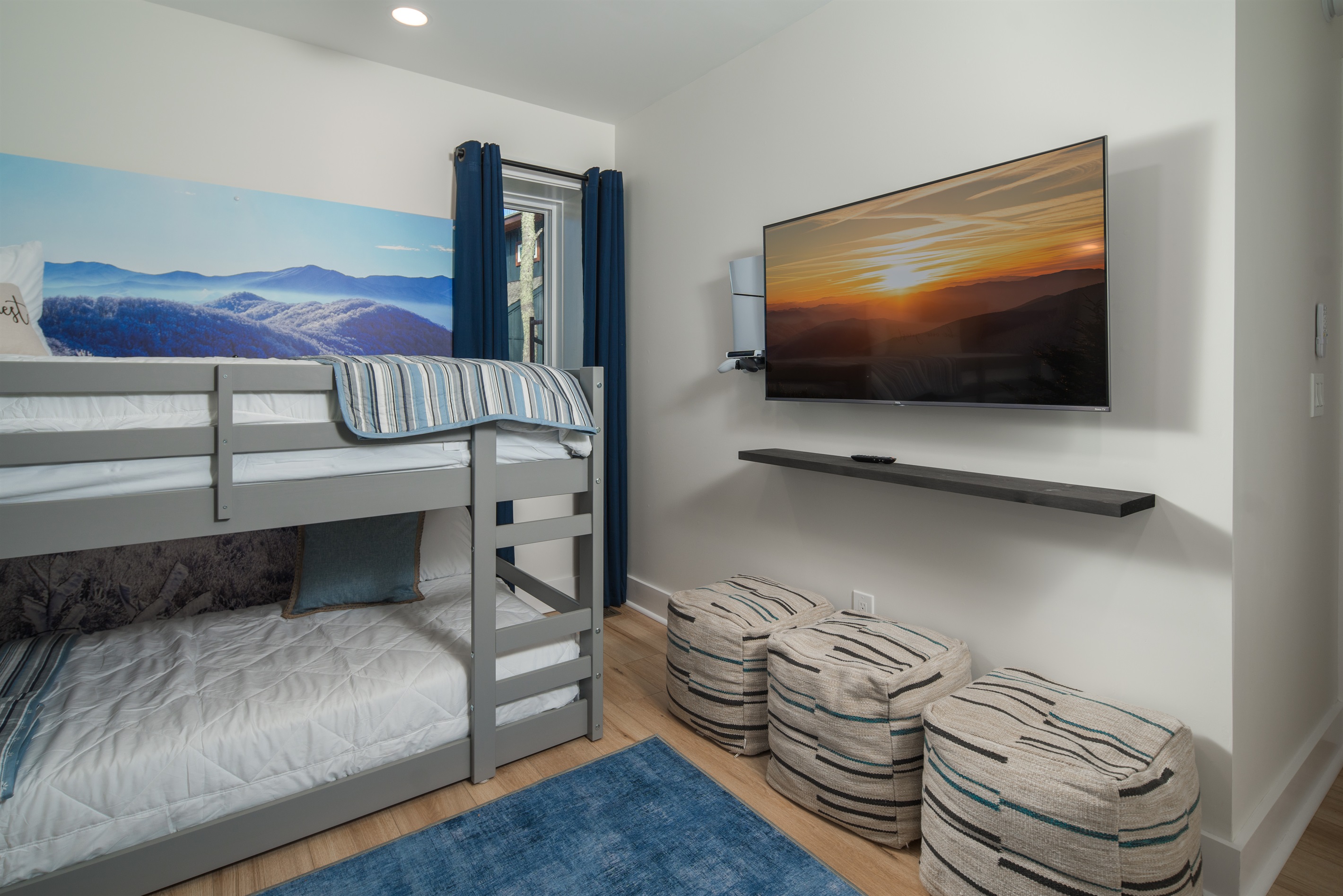 50" Roku TV and PlayStation 5, complete with two controllers.  In the closet, you'll find an extra mattress, baby gate, pack and play, and portable high chair.