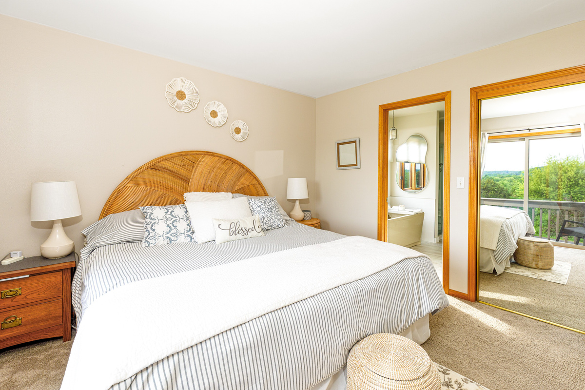 Main floor bedroom with ensuite bathroom and views of The Galena Territory