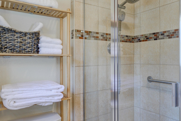 shower with teak shower seat available if needed