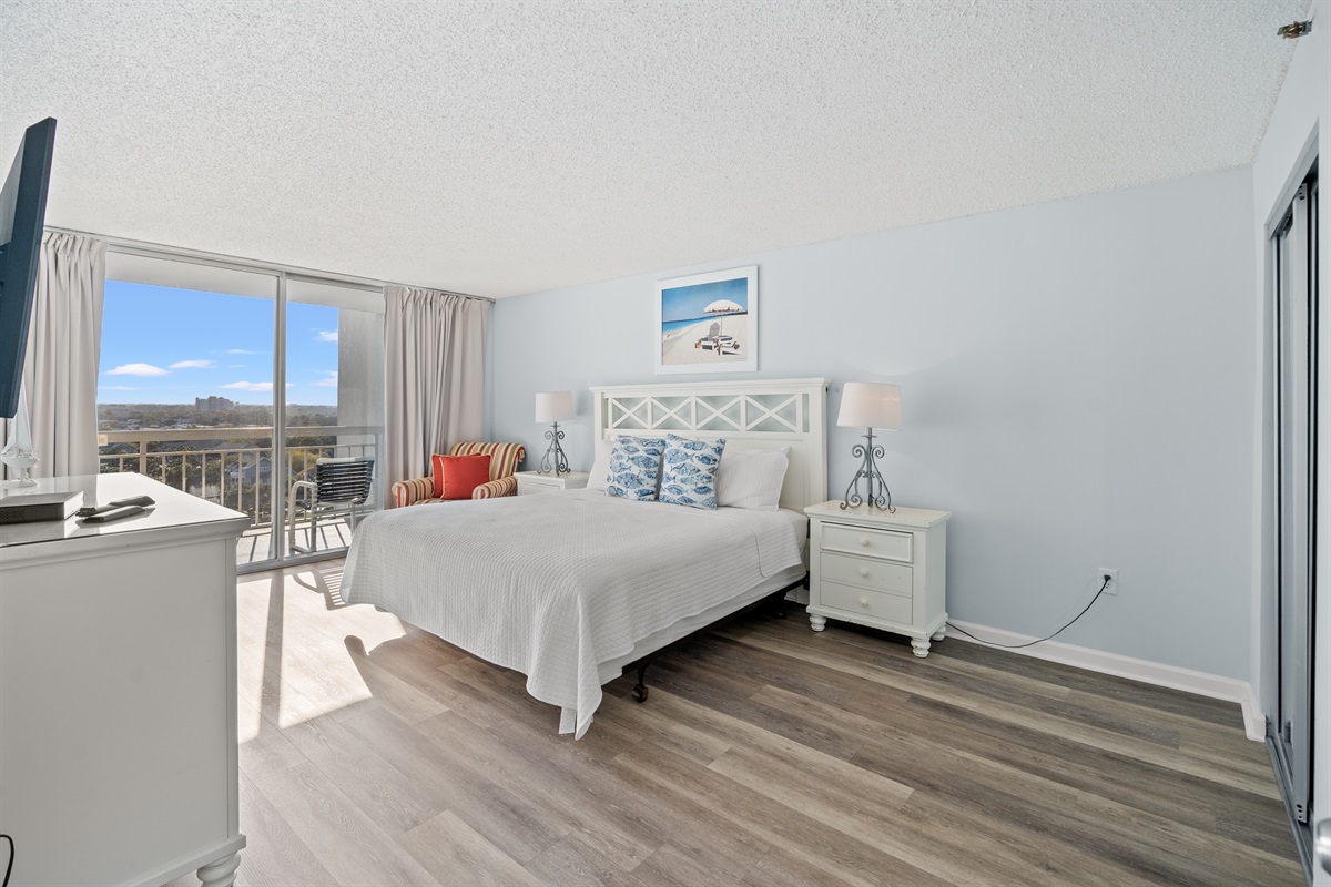 Spacious Main Bedroom with King Bed, ensuite and Balcony access